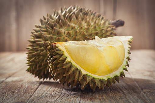 Durian on wood background